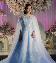 Load image into Gallery viewer, Blue embellished dress with cape
